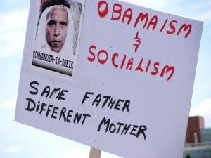 Sign showing Obama as a foreigner at a town hall in Albuquerque, August 2009. (Photo by Marjorie Childress)