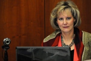 Janice Arnold-Jones, shown here webcasting a legislative committee meeting earlier this year. (Photo by Heath Haussamen)