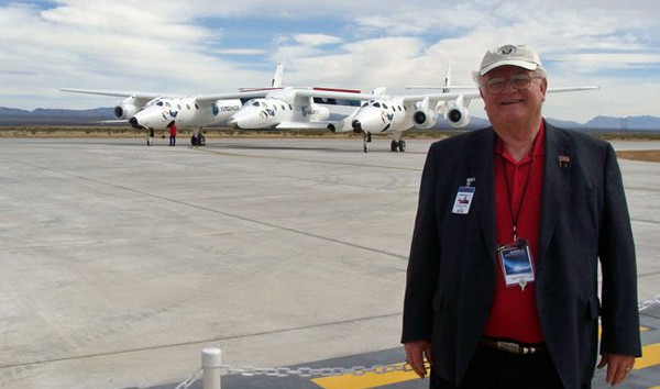 Evans, shown here at Spaceport America with Virgin Galactic’s SpaceShipTwo, which is being carried in this photo by its mothership, White Knight Two.