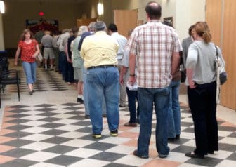As this line of voters illustrates, turnout for the Soil and Water Conservation District election in May was higher than normal -- though still at about xx percent. But in general, turnout for such elections is low.  Many believe consolidating smaller elections would reduce costs, increase public awareness and raise voter turnout.