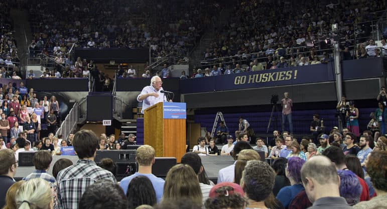Bernie Sanders, who identifies as a democratic socialist, has been met by large crowds across America, including this crowd in Seattle in August. (photo cc info)